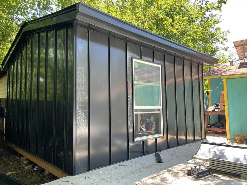 Black standing seam metal wall panels for Roof Inspection in Newcastle