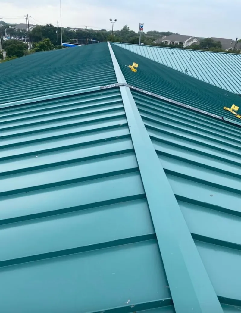 Green commercial metal roof ridge and valley for Metal Roof Repair in Newcastle